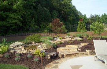 garden flagstone patio and walkway by Mobile Joe's Landscaping
