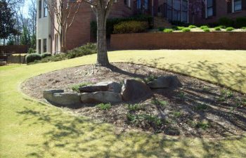 garden with hardscape by Mobile Joe's Landscaping