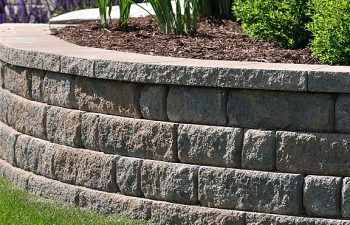 A stone rtaining wall in the garden